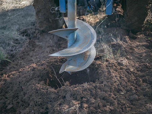 Auger for digging holes in the ground Auger for digging holes in the ground